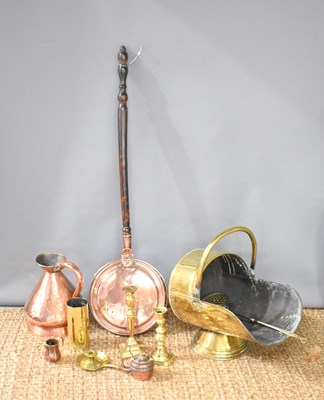 Lot 520 - A group of brass and copper ware to include a...
