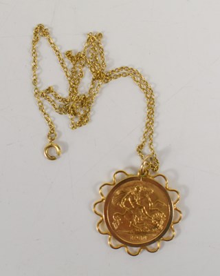 Lot 72 - A George V gold half sovereign set in a yellow...