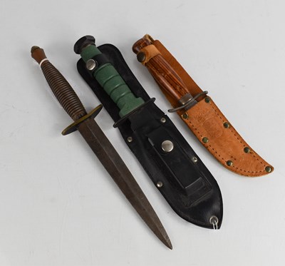Lot 454 - A Mora Swedish knife, a hunting knife and a...