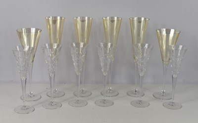 Lot 191 - A set of six cut glass champagne flutes, in a...