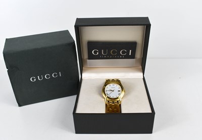 Lot 267 - A gentleman's Gucci wristwatch, the signed...