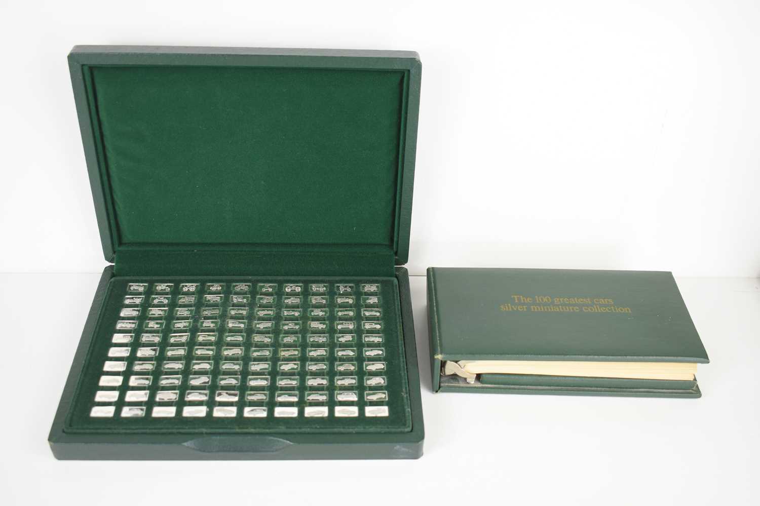 Lot 41 - A John Pinches 100 greatest cars silver...