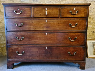 Lot 654 - A Georgian mahogany chest of drawers with...