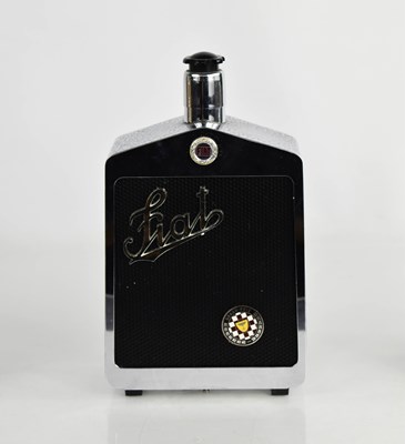 Lot 389 - A novelty Fiat musical grill decanter.