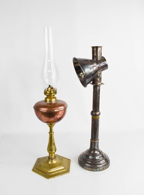 Lot 391 - An antique brass and copper table lemp,...