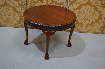 Lot 597 - A mahogany occasional table with cabriole legs...