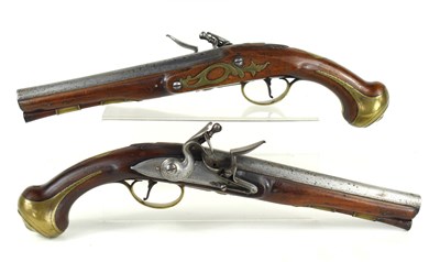 Lot 12 - A pair of 18th century flintlock pistols, the...