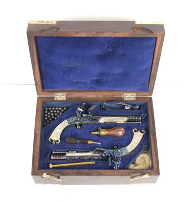 Lot 13 - A fine pair of Peter Dyson and Sons replica...