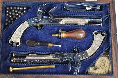 Lot 13 - A fine pair of Peter Dyson and Sons replica...