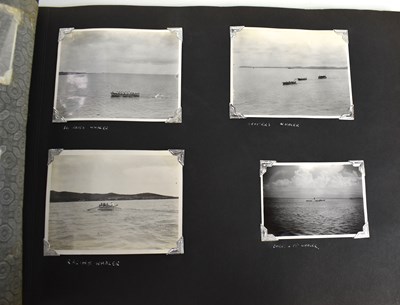 Lot 31 - A photograph album of naval photographs taken...