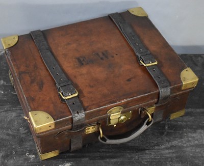Lot 19 - An early 20th century leather cartridge case,...