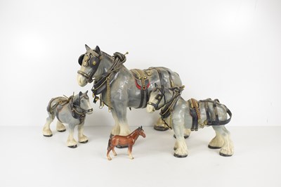 Lot 344 - Three ceramic Shire horse ornaments together...
