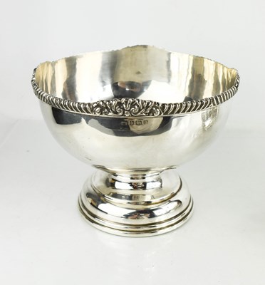 Lot 283 - A George V silver rose bowl with a scroll and...