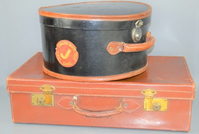Lot 370 - A vintage leather suitcase together with a...