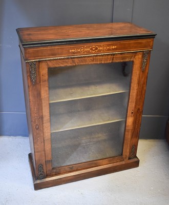 Lot 663 - A 19th century walnut inlaid pier cabinet,...