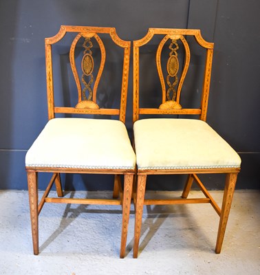 Lot 664 - A pair of satinwood saloon chairs in the...