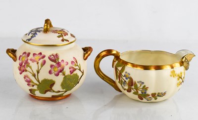 Lot 50 - A ROyal Worcester gilded ivory ground jug,...