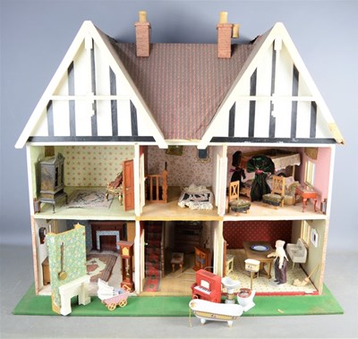 Lot 487 - A vintage handmade dolls house complete with...
