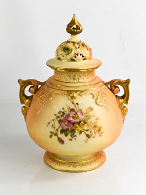 Lot 18 - A Royal Worcester blush ivory vase, and cover...
