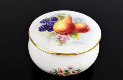 Lot 56 - A Royal Worcester box and cover, the lid...