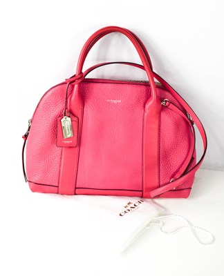 Lot 204 - A Coach pink leather handbag, A1482-30144,...