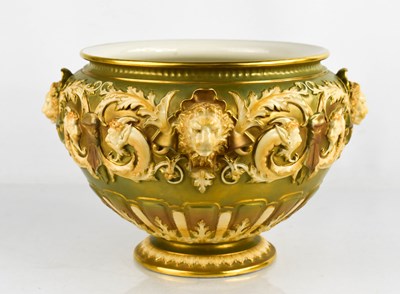 Lot 20 - A Royal Worcester jardinere, moulded with lion...
