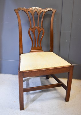 Lot 630 - A George III Chippendale revival dining room...