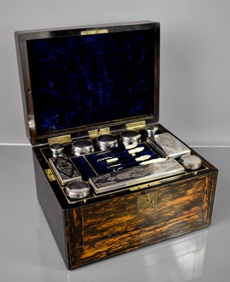 Lot 310 - A 19th century coromandel dressing table box,...