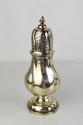 Lot 277 - A George V silver baluster castor, by George...