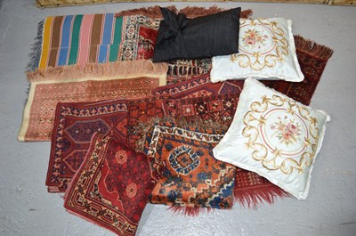 Lot 497 - A quantity of small rugs including two striped...