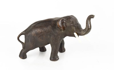 Lot 412 - A 19th century bronze elephant with ivory...