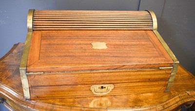 Lot 301 - A Victorian teak campaign writing slope with...