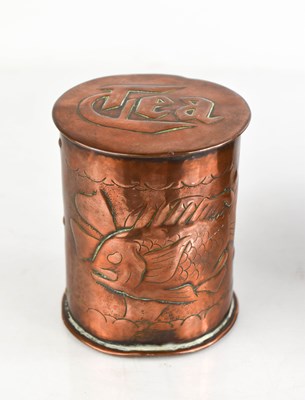 Lot 408 - A Newlyn copper tea caddy with embossed fish...