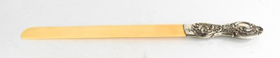Lot 251 - A Victorian ivory page tuner with silver...
