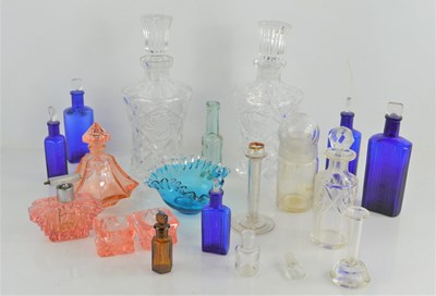 Lot 258 - A group of glass medicine bottles, decanters...