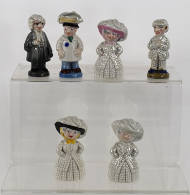 Lot 146 - A collection of Wade figurines, comprising of...