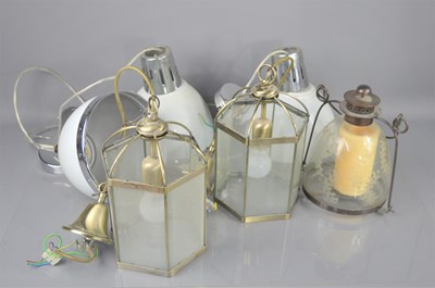 Lot 381 - A group of hanging ceiling lights, three are...
