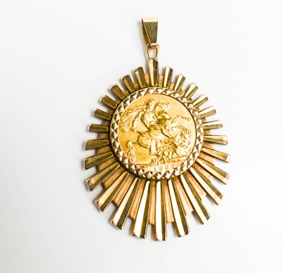 Lot 43 - An Edward VII gold sovereign, 1909, in 9ct...
