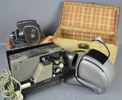 Lot 453 - A vintage Guardsman film projector together...