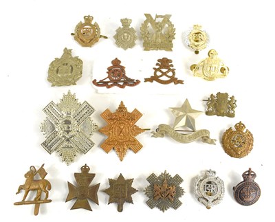 Lot 47 - A group of regimental cap badges to include...
