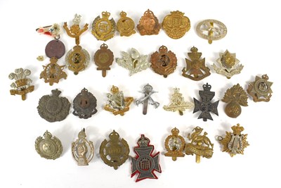 Lot 36 - A group of cap badges for British regiments...