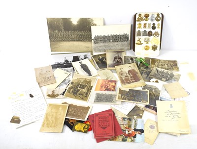 Lot 44 - A group of regimental cap, collar and uniform...