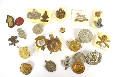 Lot 40 - A group of regimental cap badges, including...