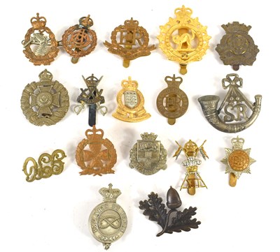 Lot 42 - A group of military cap badges including...
