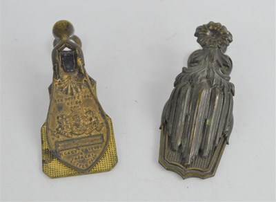 Lot 269 - Two Victorian brass letter clips by Merry,...