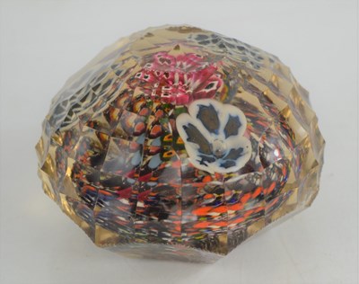 Lot 236 - An unusually shaped glass paperweight with...
