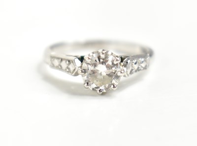 Lot 215 - A platinum and diamond solitaire ring, the...