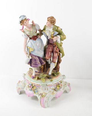 Lot 117 - A 19th century German porcelain figure group,...