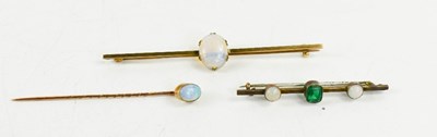 Lot 561 - A 9ct gold and opal set bar brooch 7½cm long,...
