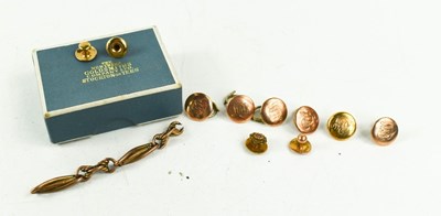 Lot 562 - A set of six 9ct gold buttons on steel hoops,...